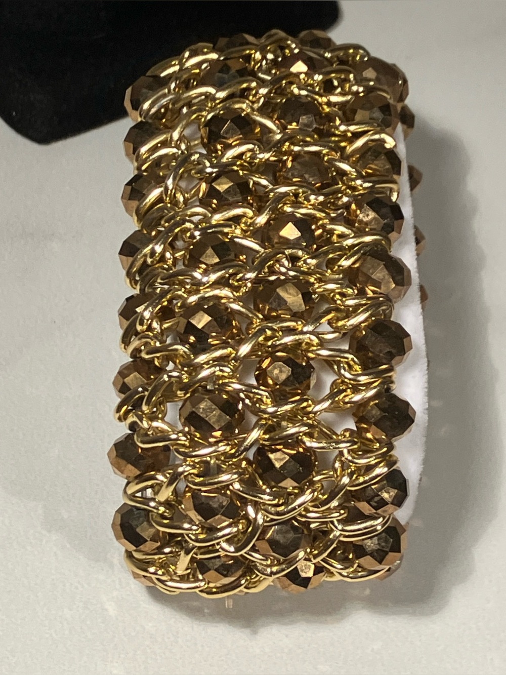‘Gorgeous’ glittering golden stretch bracelet.